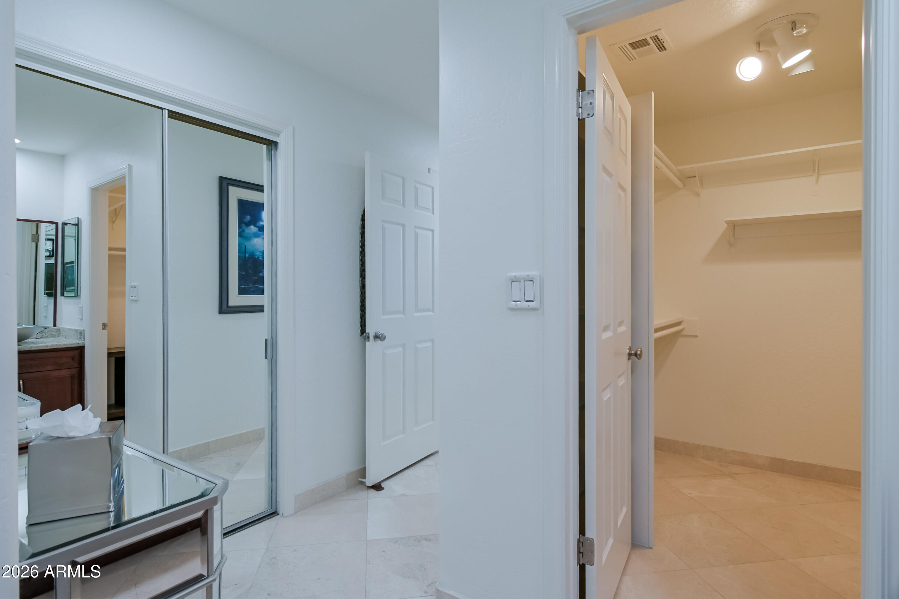 7955 East Chaparral Road, Unit 62 Scottsdale, AZ 85250 - Photo 17 of 38 a bathroom with a mirror