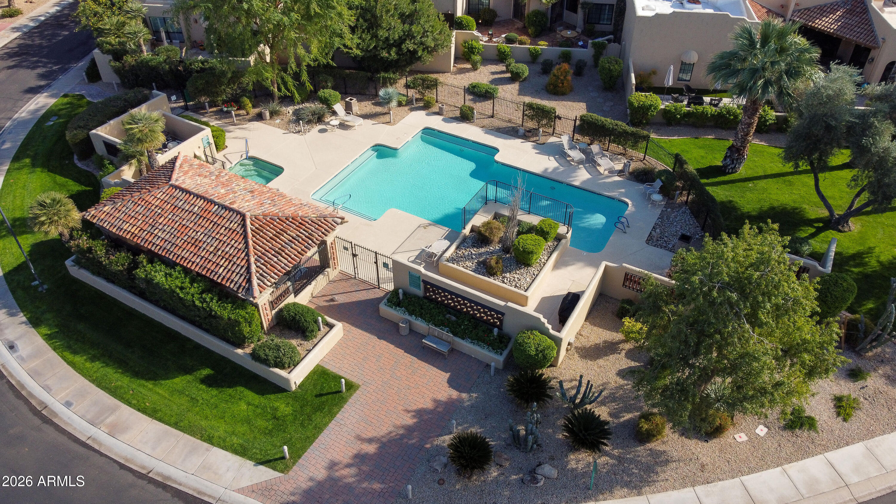 7955 East Chaparral Road, Unit 62 Scottsdale, AZ 85250 - Photo 27 of 38 a view of a backyard with sitting area