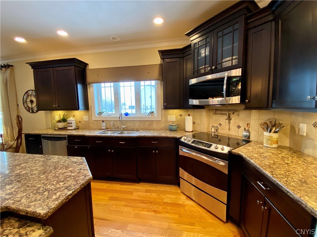 4981 Astilbe Path Clay, NY 13088 - Photo 11 of 48 Cambria Quartz counters, soft close cabinetry, cer