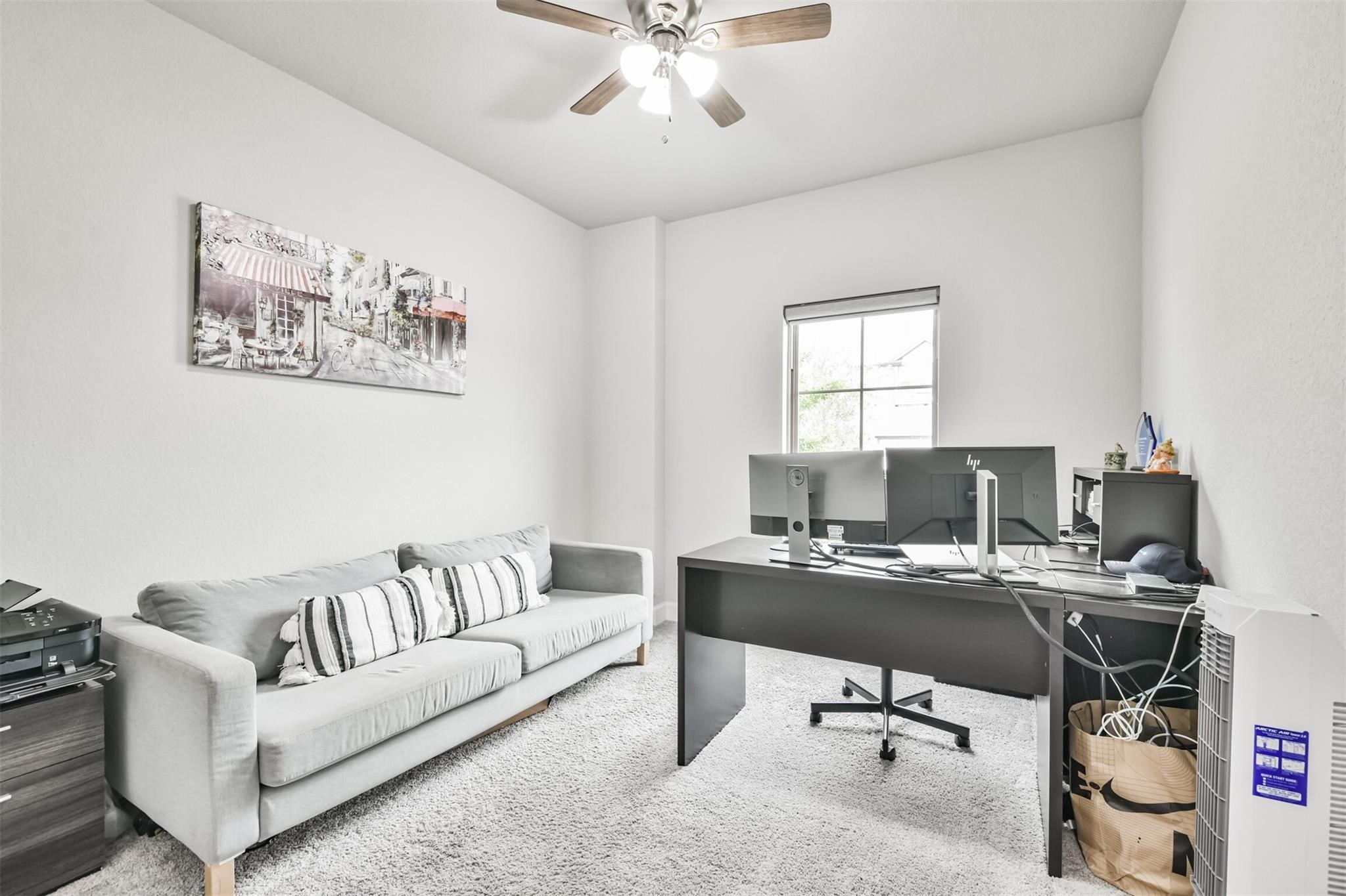 15018 Concho River Way Cypress, TX 77433 - Photo 23 of 34 a work room with furniture and a window