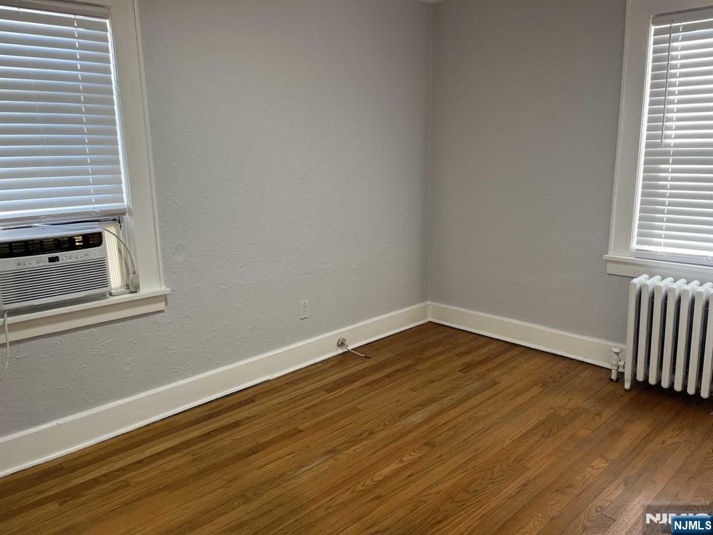 212 Walton Street, Unit 2 Ridgewood, NJ 07450 - Photo 18 of 27 a view of a room with wooden floor and window