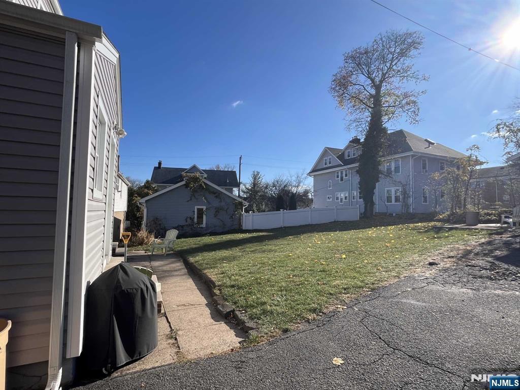 212 Walton Street, Unit 2 Ridgewood, NJ 07450 - Photo 25 of 27 a view of a house with a yard