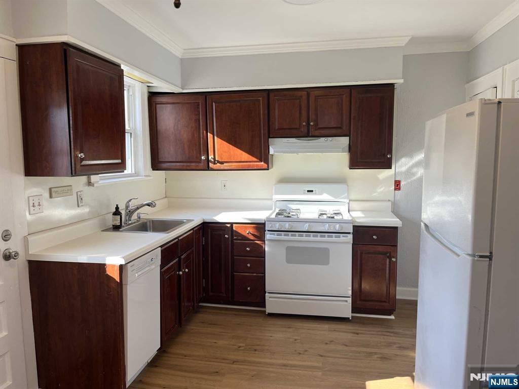 212 Walton Street, Unit 2 Ridgewood, NJ 07450 - Photo 3 of 27 a kitchen with a sink stove and refrigerator