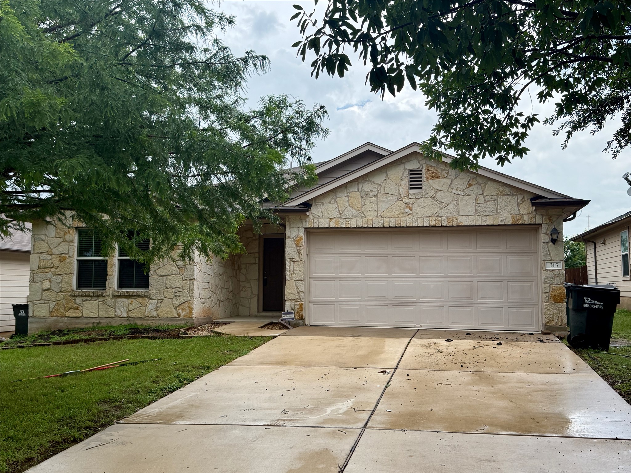 315 Nottingham Loop Kyle, TX 78640 - Photo 1 of 16 A classic stone facade with an attached garage welcomes you home.