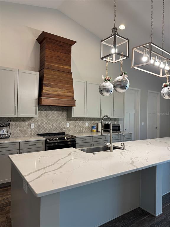 4155 Albritton Road St. Cloud, FL 34772 - Photo 9 of 40 a kitchen with a sink and cabinets