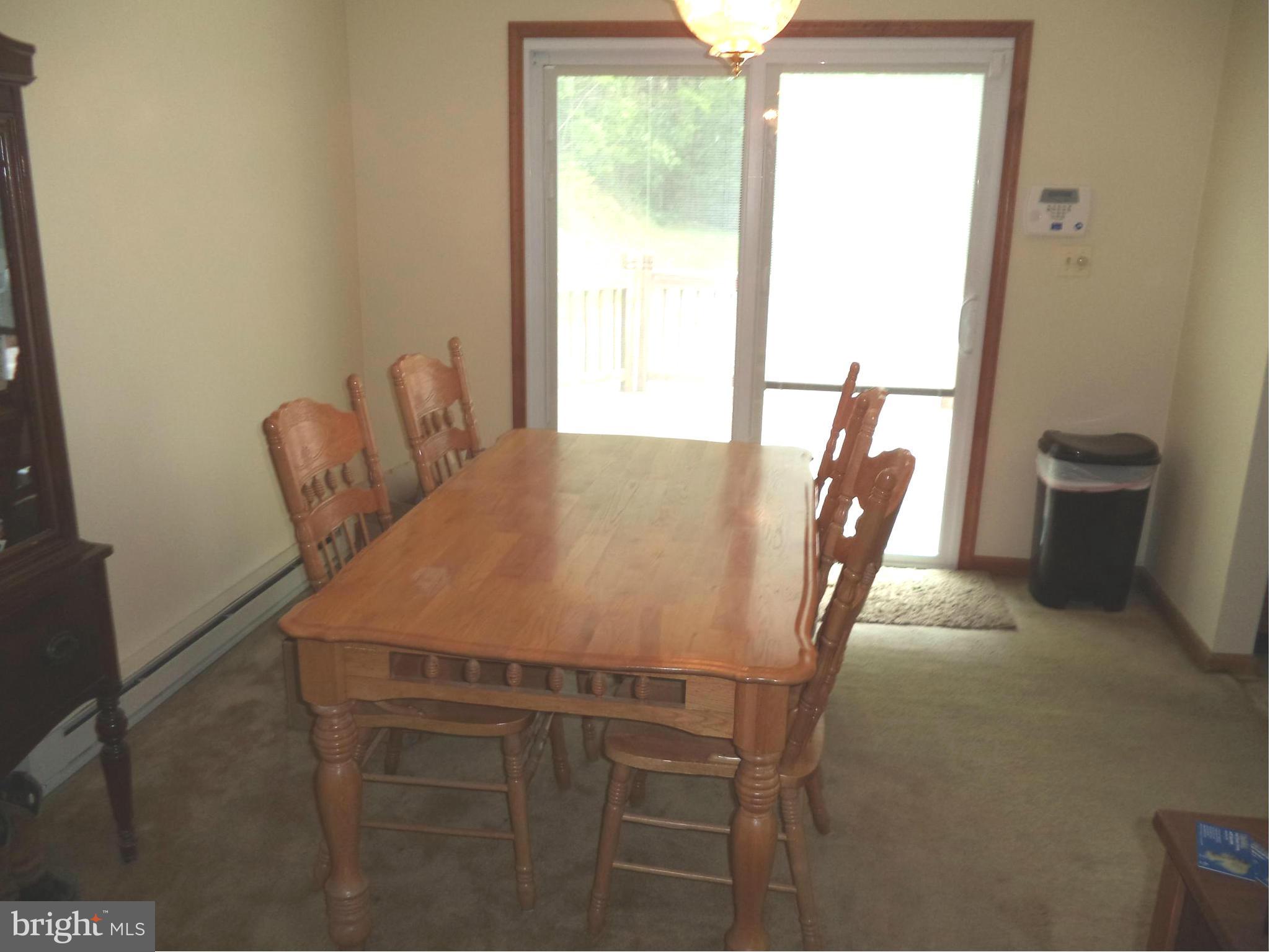 87 Shenandoah Ranch Road Harpers Ferry, WV 25425 - Photo 8 of 24 Dining Room with slider leading to rear deck