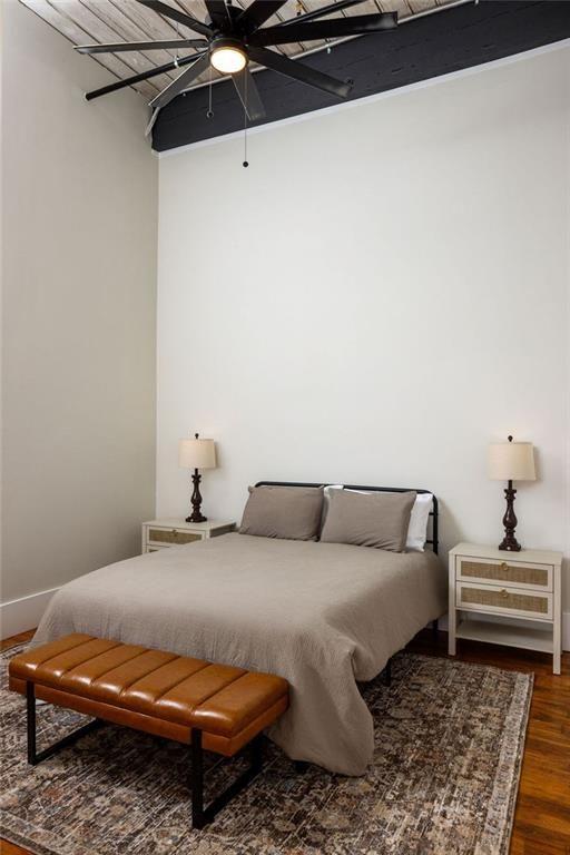 200 F Barrett Street, Unit 322 Monroe, GA 30655 - Photo 3 of 15 a bedroom with a bed and a rug