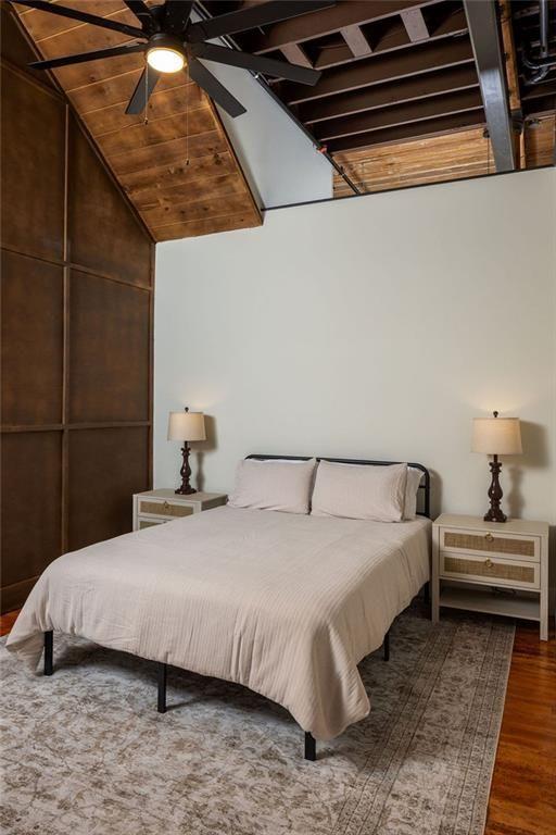 200 F Barrett Street, Unit 322 Monroe, GA 30655 - Photo 6 of 15 a bedroom with a bed and lamp