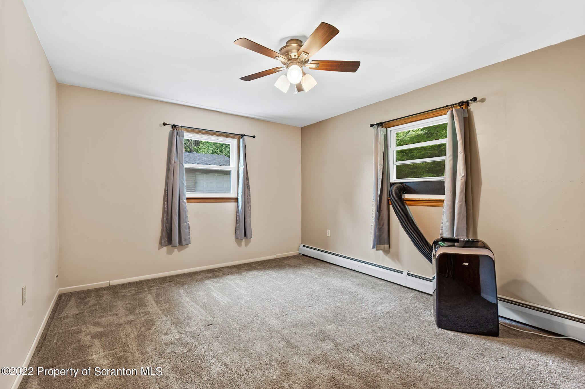 199 Spring Hill Road Moscow, PA 18444 - Photo 16 of 33 an empty room with windows
