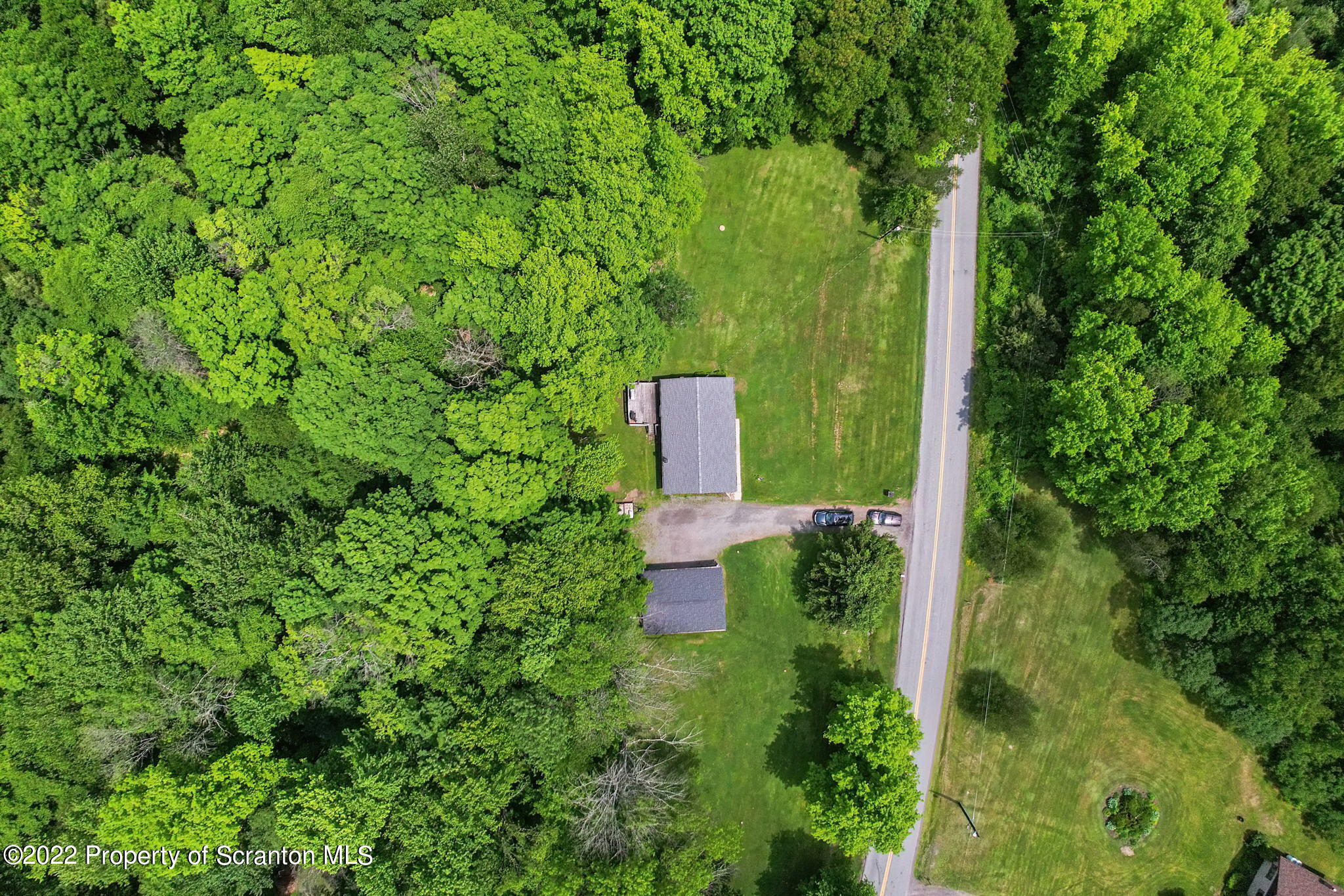 199 Spring Hill Road Moscow, PA 18444 - Photo 19 of 33 an aerial view of a house with a yard
