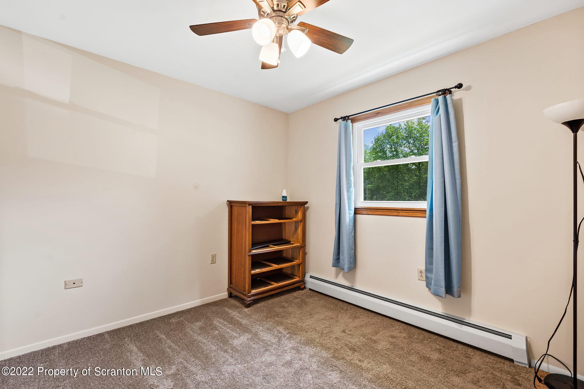199 Spring Hill Road Moscow, PA 18444 - Photo 20 of 33 wooden floor in an empty room with a window