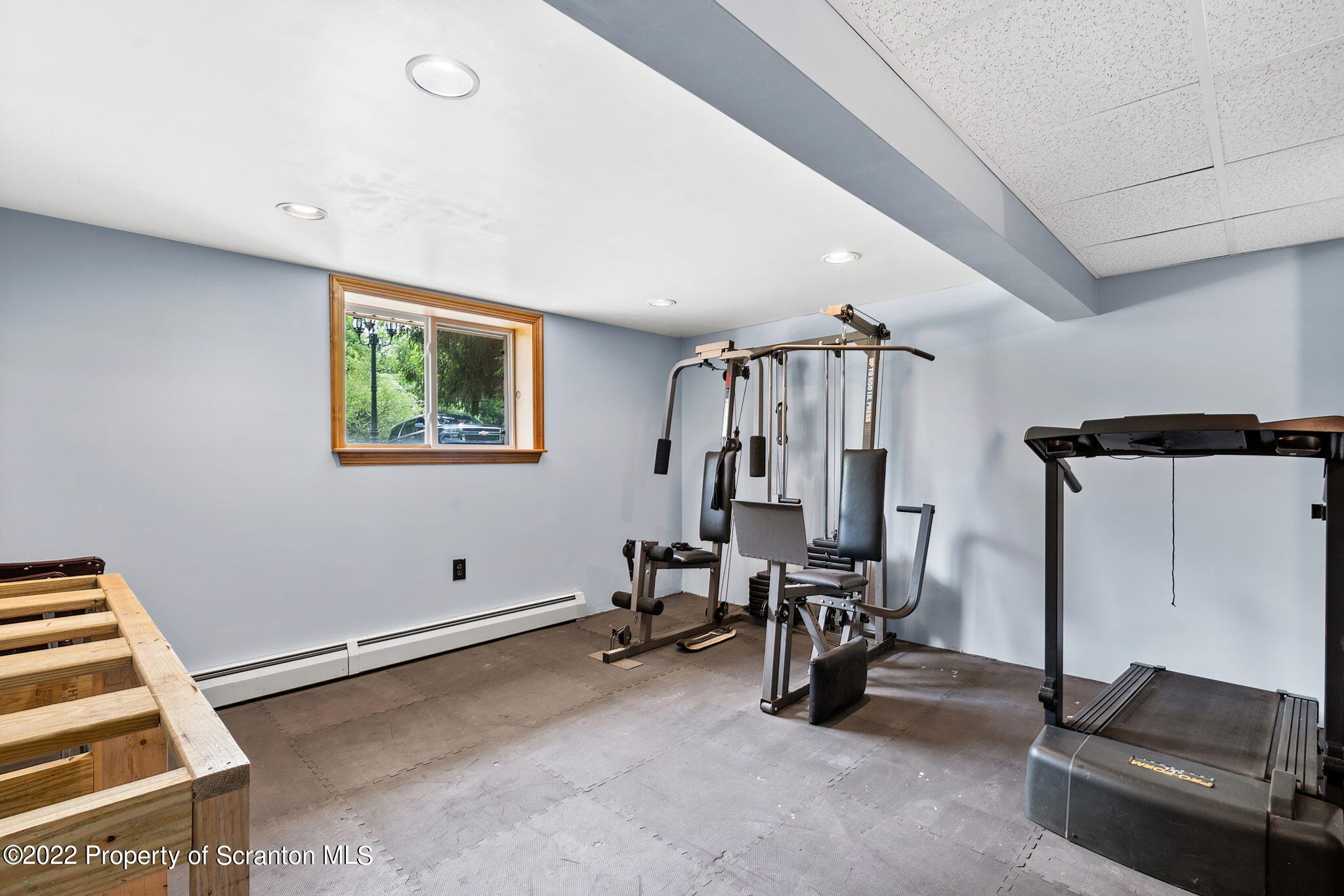 199 Spring Hill Road Moscow, PA 18444 - Photo 30 of 33 a view of a room with gym equipment