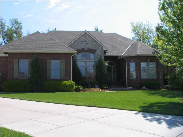 Elegant home in a quiet cul-de-sac with 3 car side load garage and pond/lake frontage.