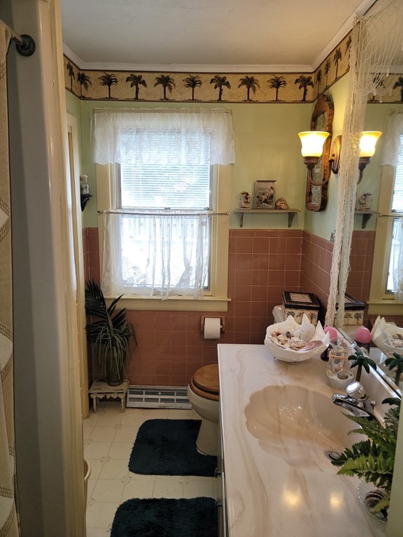 73 Hollow Road Brimfield, MA 01010 - Photo 17 of 23 a bathroom with a sink mirror toilet and shower
