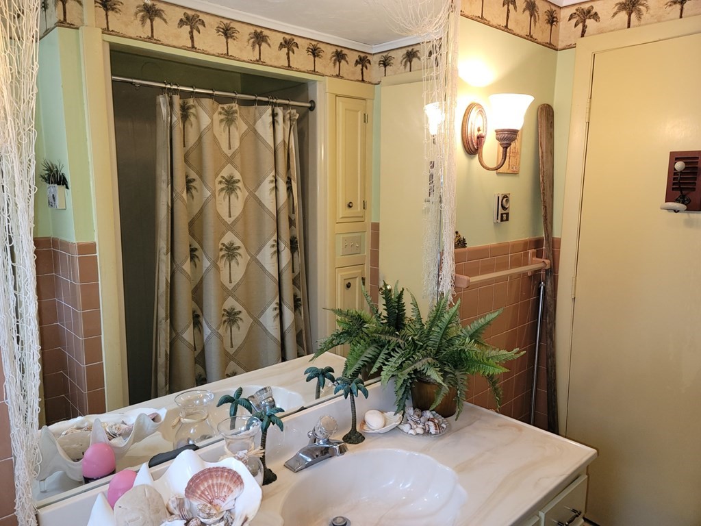73 Hollow Road Brimfield, MA 01010 - Photo 18 of 23 a bathroom with a sink toilet and shower