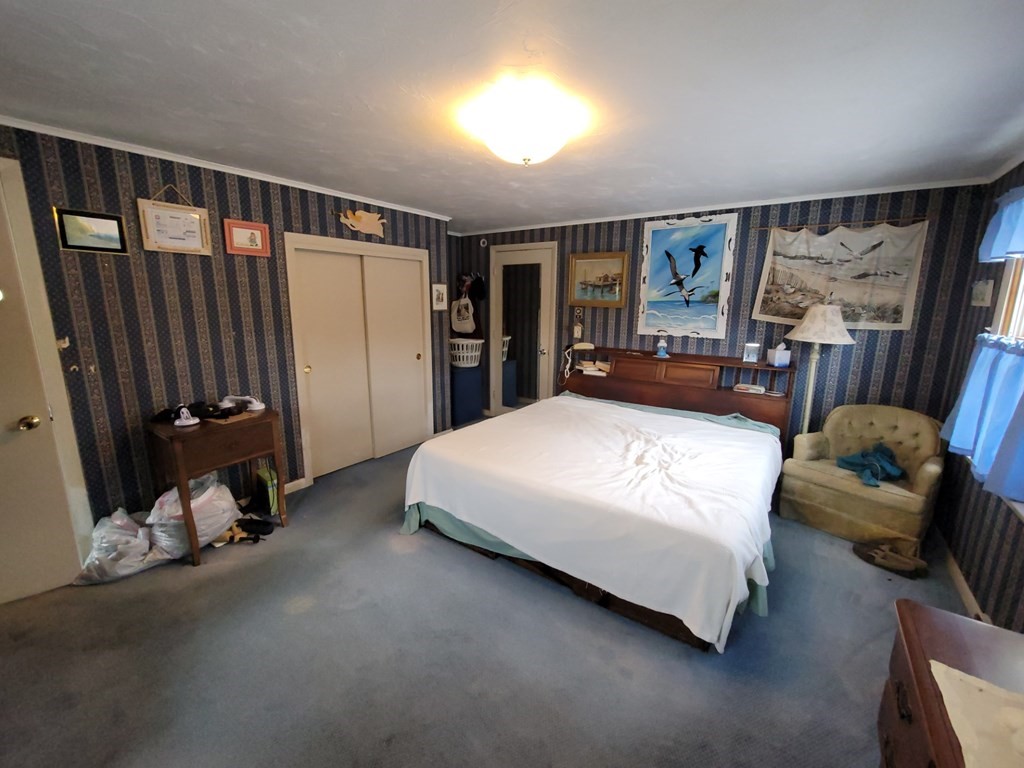 73 Hollow Road Brimfield, MA 01010 - Photo 20 of 23 a bed room with a bed and a window