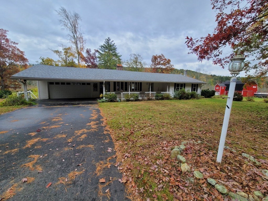 73 Hollow Road Brimfield, MA 01010 - Photo 2 of 23 a view of a house with a yard