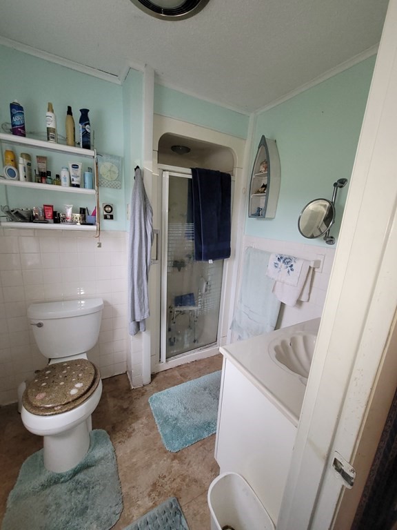 73 Hollow Road Brimfield, MA 01010 - Photo 21 of 23 a bathroom with a toilet and a sink