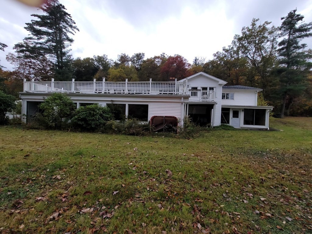 73 Hollow Road Brimfield, MA 01010 - Photo 4 of 23 a front view of a house with a garden