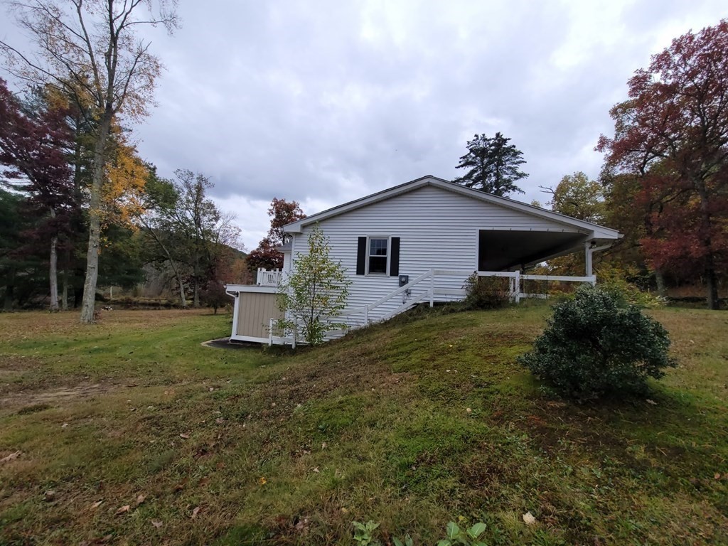 73 Hollow Road Brimfield, MA 01010 - Photo 7 of 23 a view of a house with a yard