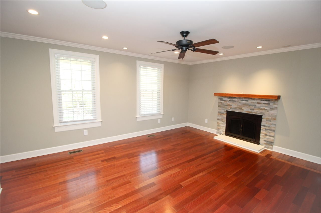 Gorgeous solid hardwoods installed after seller's purchase! Living Room