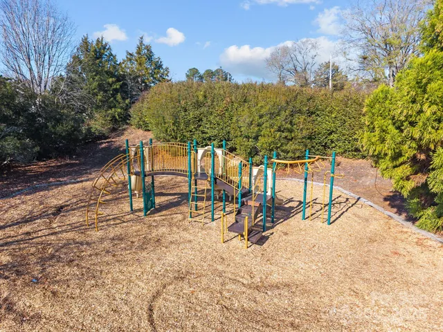a view of a swimming pool with lounge chair