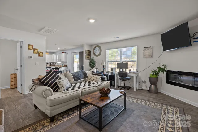 a bathroom with a sink mirror and toilet