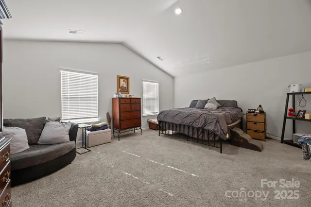 a bathroom with a double vanity sink and mirror