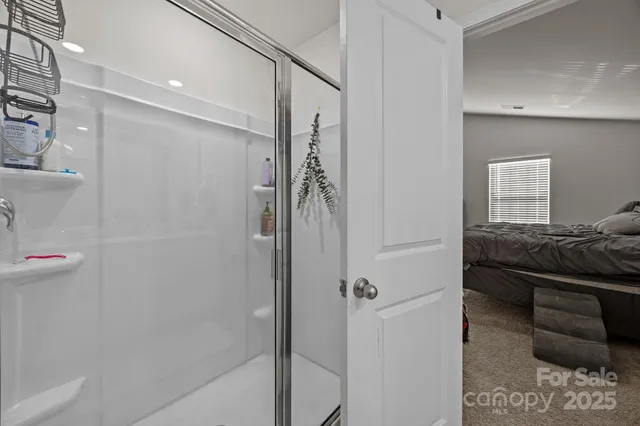 a view of house with backyard and sitting area