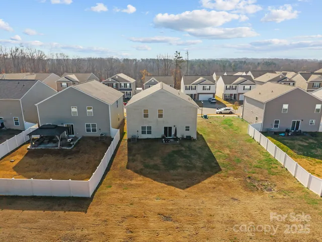 a view of a house with a swimming pool