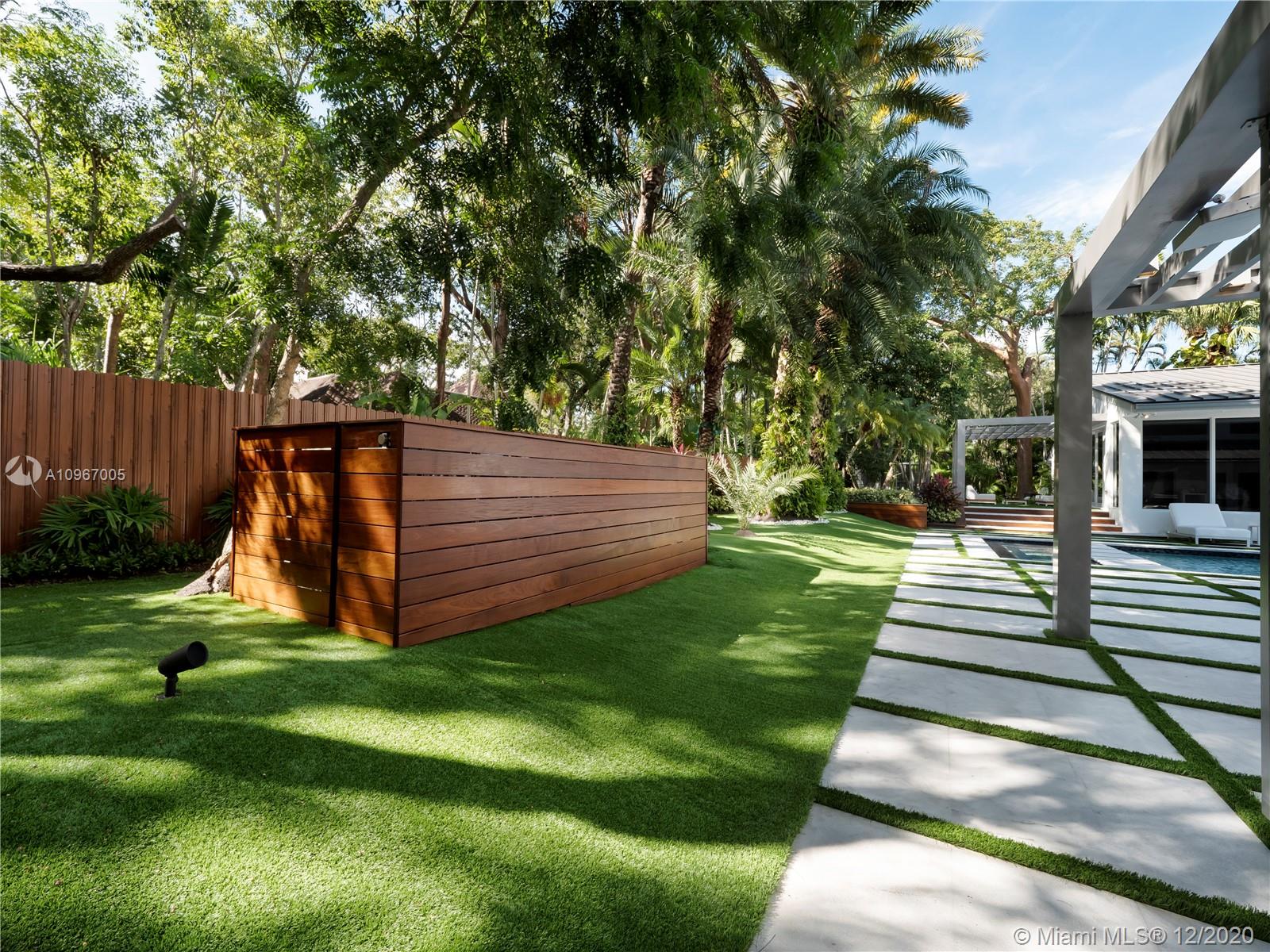 6460 Southwest 133rd Drive Pinecrest, FL 33156 - Photo 47 of 51 Pool equipment framed in IPE wood