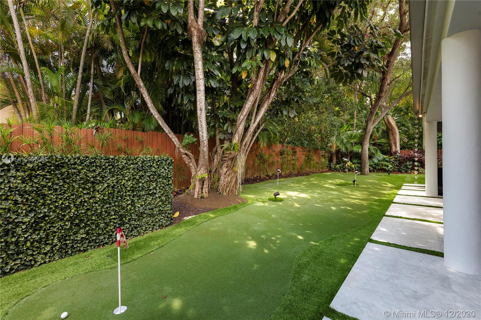 6460 Southwest 133rd Drive Pinecrest, FL 33156 - Photo 50 of 51 TopPutting - 12 hole green, surrounding perimeter of house. Dura Fence - rich bronze steel, maintenance free.
