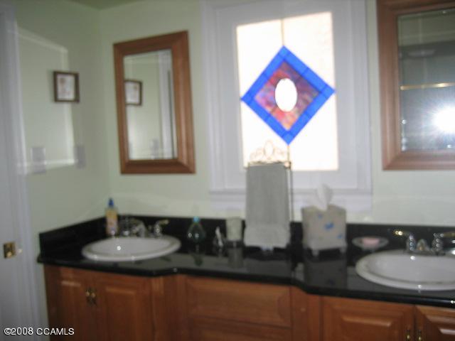1503 Rhem Avenue New Bern, NC 28560 - Photo 11 of 13 Double Vanity & Pocket Door To Family Room