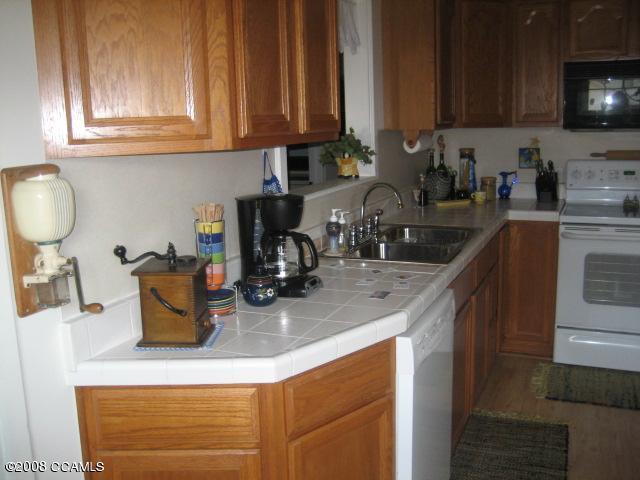 Completely Updated Kitchen Has Tile Countertops