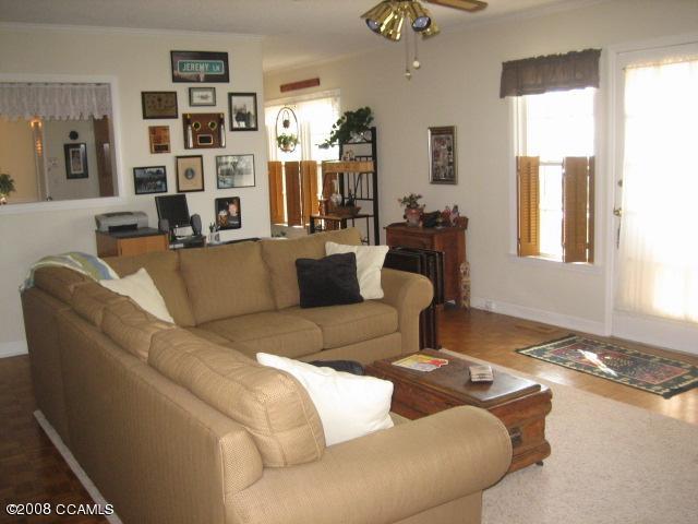 1503 Rhem Avenue New Bern, NC 28560 - Photo 9 of 13 Deck off Family Room & Pass thru to Kitchen