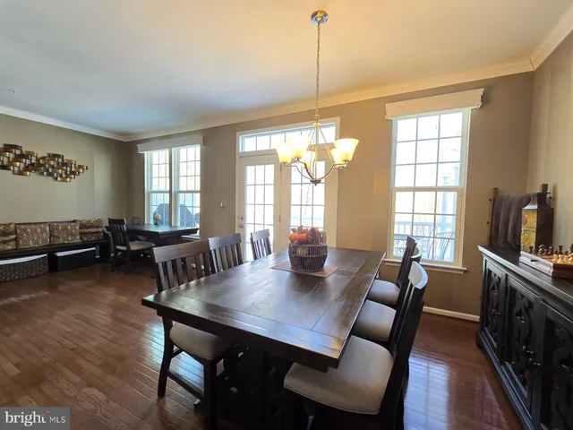 a bedroom with a bed and a television