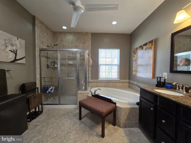 a view of a hallway with wooden shelves