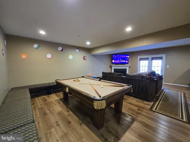 a bathroom with a sink toilet and mirror