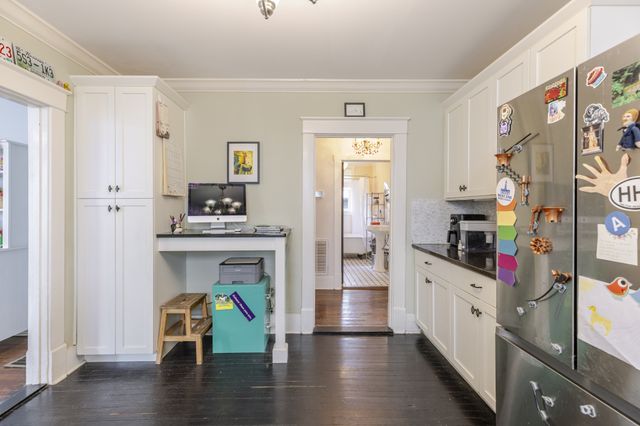 a room with furniture and wooden floor