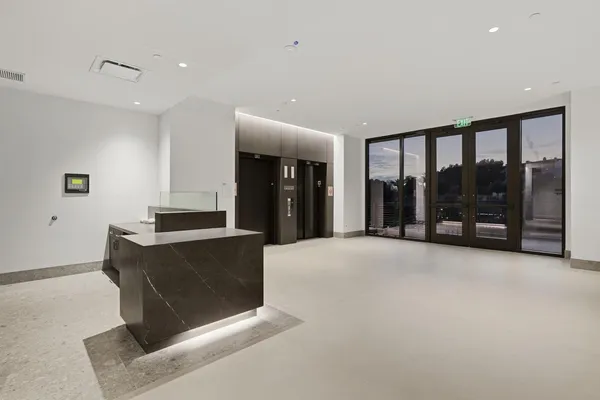 a living room with a couch and a flat screen tv