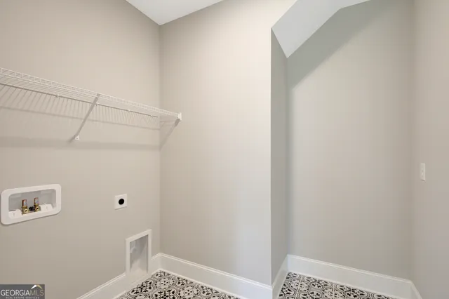 a view of a bathroom from a hallway