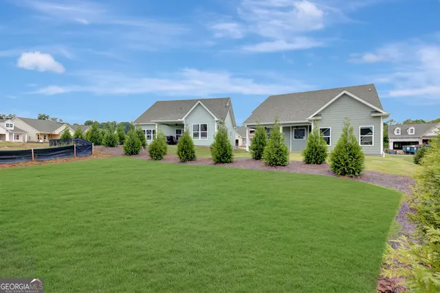 a view of house with outdoor space area