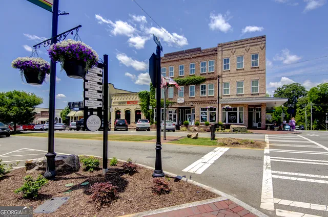 a view of a building with a street