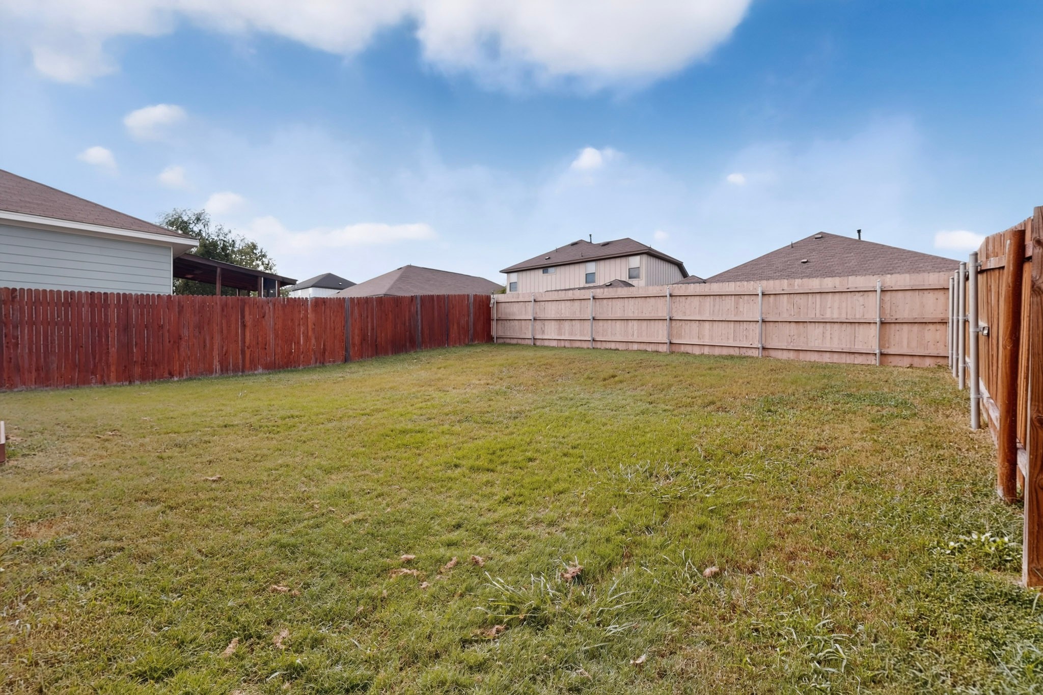 132 Wapiti Road Buda, TX 78610 - Photo 27 of 31 Secure yard for private outdoor enjoyment.