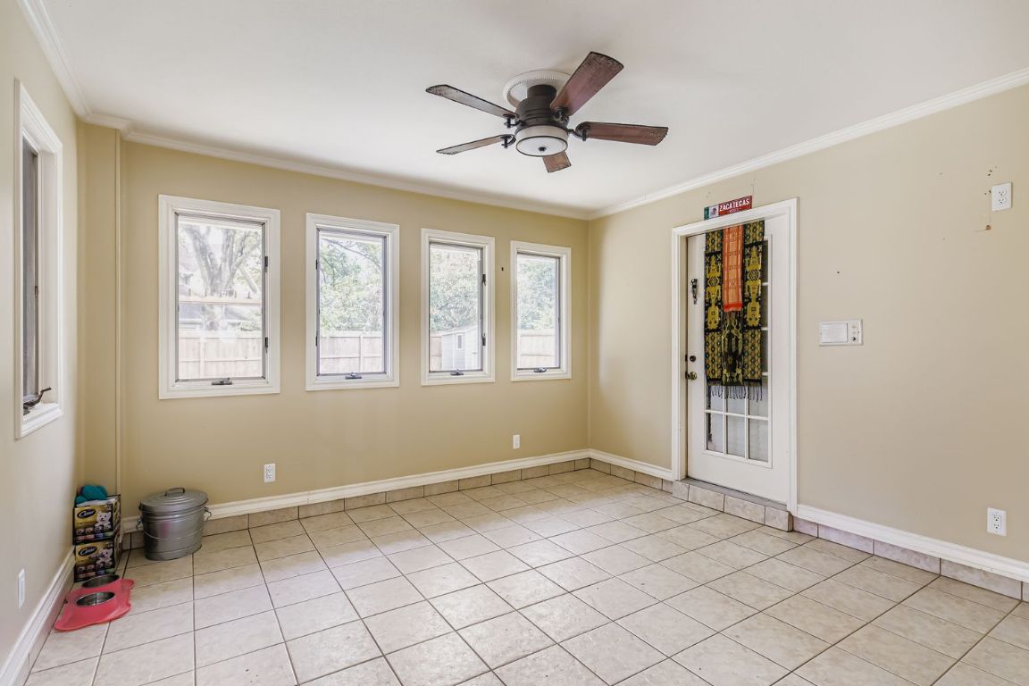 10705 Pinehurst Drive Austin, TX 78747 - Photo 14 of 30 This flex room could be used for an office, exercise space, art studio - whatever you see fit!