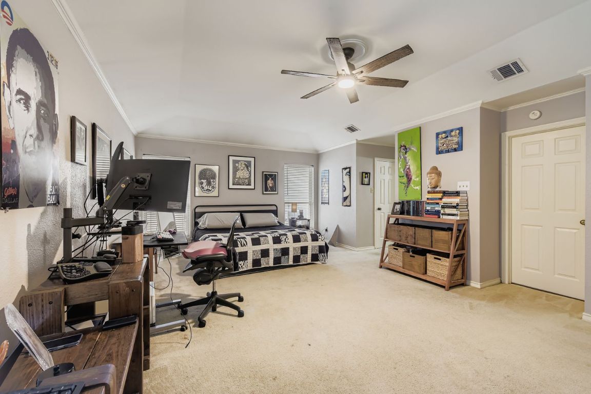 10705 Pinehurst Drive Austin, TX 78747 - Photo 15 of 30 The primary bedroom is huge - room for a home office, sitting area, reading nook...
