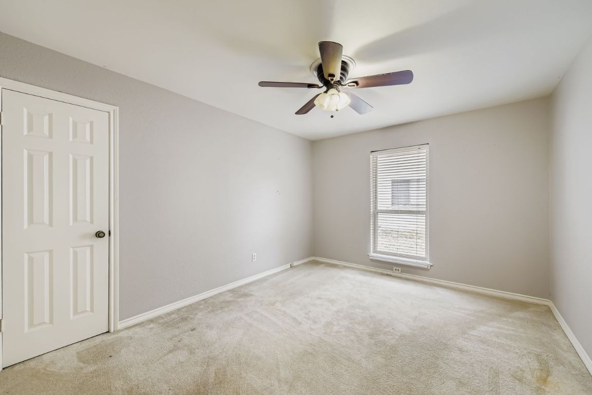 10705 Pinehurst Drive Austin, TX 78747 - Photo 30 of 30 One of three guest rooms in this mother-in-law floor plan.