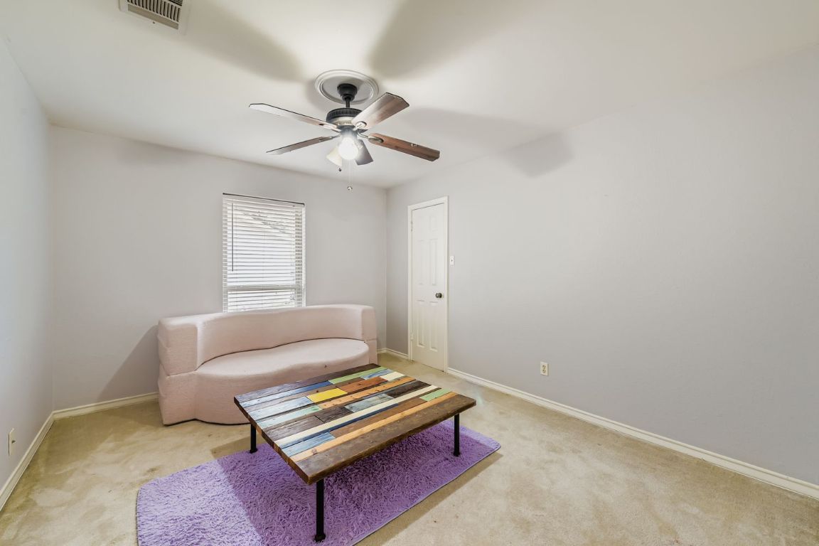 10705 Pinehurst Drive Austin, TX 78747 - Photo 19 of 30 The second of the guest rooms.