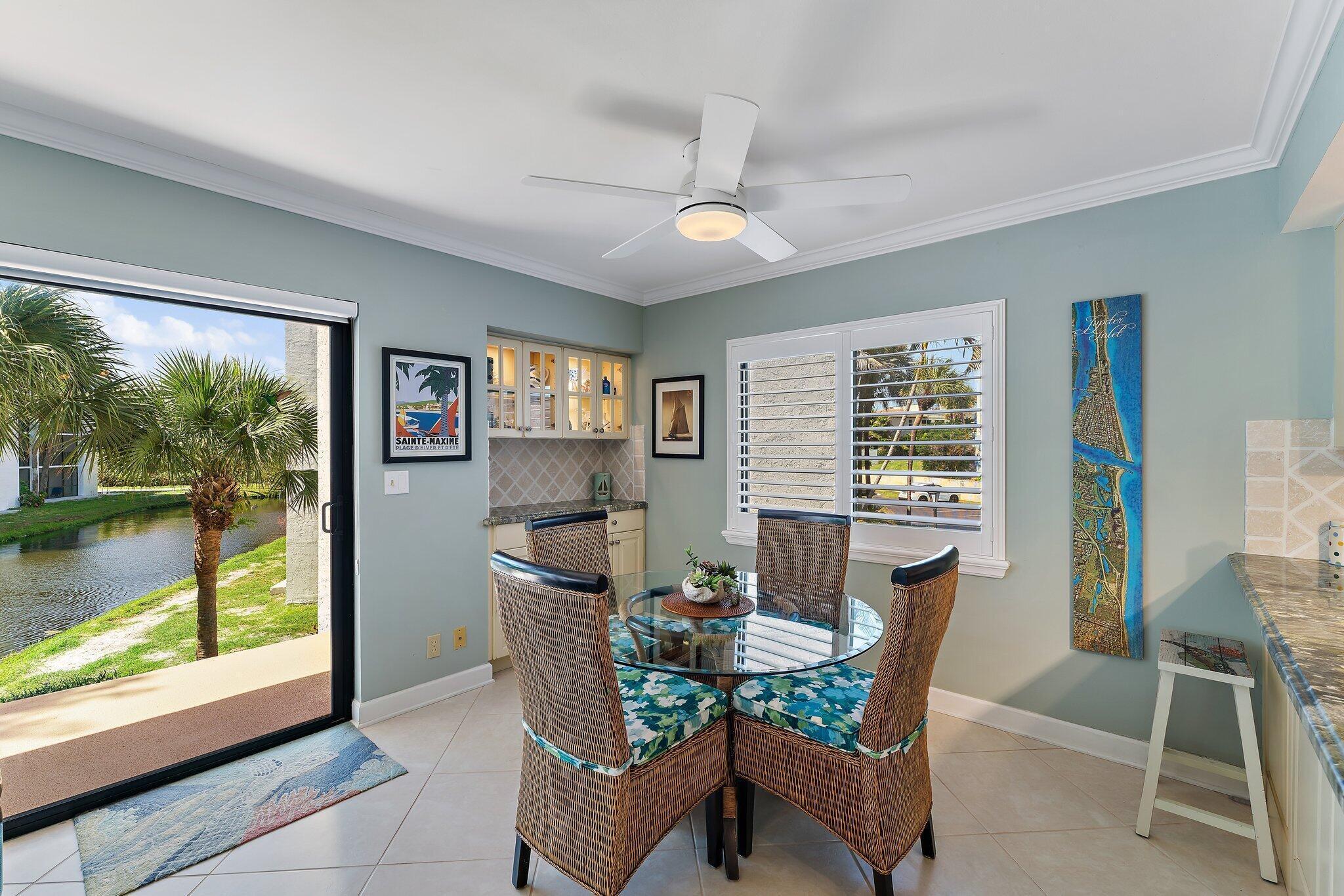 1605 Us-1, Unit B206 Jupiter, FL 33477 - Photo 9 of 35 a view of a dining room with furniture window and outside view
