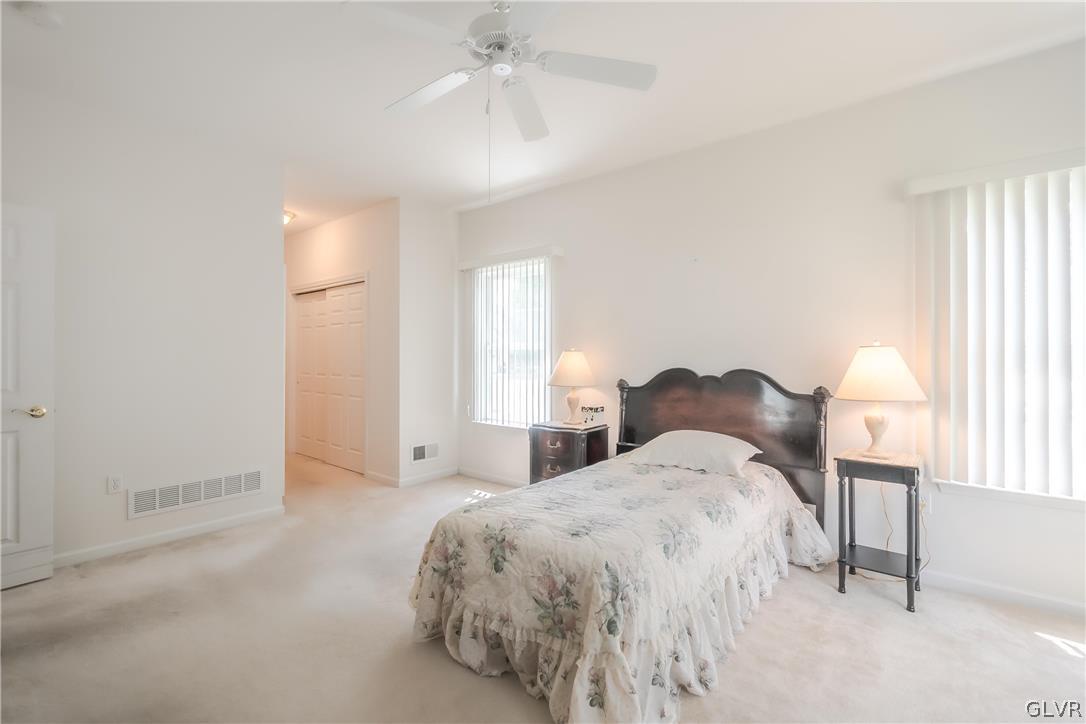 5536 Republic Way Bethlehem, PA 18017 - Photo 17 of 34 a spacious bedroom with a bed and a window